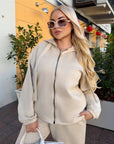 Velour hooded set in polyester and spandex, an elegant and comfortable women's outfit.