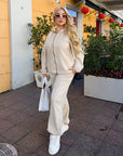 Velour hooded set in polyester and spandex, with a soft and stylish design, made for comfort and everyday wear.
