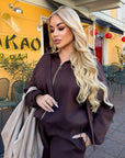 Velour hooded set in polyester and spandex, made from a fabric that is soft and pleasant to the touch.