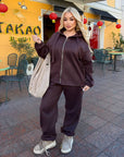 Velour hooded set in polyester and spandex, a soft and stylish athleisure outfit.