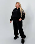 Warm fleece set in polyester and elastane, with a pleasant texture and comfortable design for cold weather.