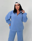 Warm fleece set in polyester and elastane, with a soft texture and comfortable design, suitable for winter conditions.