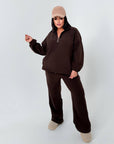 Warm fleece set in polyester and elastane, image of a comfortable warm outfit in a light colour.