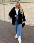 Short faux fur coat in polyester and acrylic, stylish design, fashion image in white and black