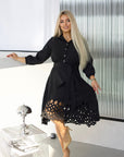 Flared dress with cut-outs and stones, polyester, viscose and spandex, a stylish women's dress with details.