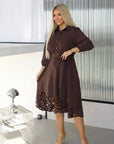 Flared dress with cut-outs and stones, polyester, viscose and spandex, an elegantly designed style with details.