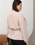 V-neck blouse in viscose and polyester, a fashionable women's style.