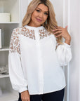 Elegante Bluse mit auffälliger Stickerei