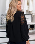 Elegante blouse met opvallende borduursels