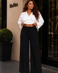Pantaloni eleganti cu picioare late