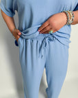 Ribbed knitен комплект с cotton, spandex и polyester, мек и комфортен за ежедневна носия.
