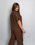 Ribbed knit set с cotton и spandex, включващ топ и pants, в светъл цвят, за комфорт и стил.