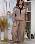 Fleece set with stripes in polyester and elastane, image of a striped top and trousers for sport and leisure.