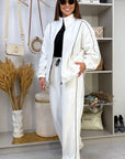 Fleece set with stripes in polyester and elastane, suitable for sport and leisure, image of a product with stripes.