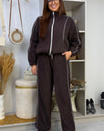 Fleece set with stripes in polyester and elastane, comfortable and warm, suitable for cold weather, with coloured stripes.