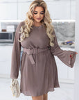 Къса рокля от структурирана Fabric с polyester и spandex, модел EU082025, показана на снимката.