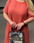 Loose-fit dress with ruffles