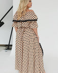 Long polka-dot dress with ruffle