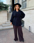 Cropped cardigan with a belt made from polyester and viscose, black, with cut and belt, suitable for stylish everyday outfit.