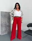 Women's wide-leg trousers made from polyester, viscose and spandex, shown on a model, suitable for everyday style.