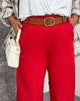 Women's wide-leg trousers made from polyester, viscose and spandex, image of a model, worn elegant style.
