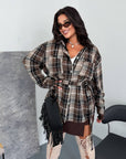 Checked shirt with a belt made from cotton and polyester, image of a model, worn stylish everyday outfit.