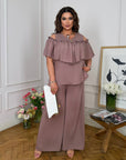 Комплект от памучна Fabric с волан, съдържа 70% cotton и 30% polyester, предназначен за комфорт и стил.