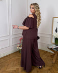 Комплект от памучна Fabric с волан, съдържащ 70% cotton и 30% polyester, показан на изображението.