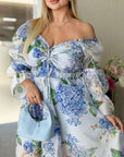 Миди рокля от organza с флорални мотиви, polyester, светла и елегантна за летни поводи, изображение на рокля с цветен принт.