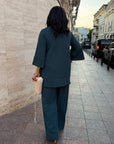 Loose-fitting set with rhinestones, made from polyester, viscose and lycra, image of elegant women's set.