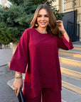 Loose-fitting set with rhinestones, made from polyester, viscose and lycra, comfortable and stylish clothing.