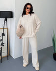 Soft ribbed-knit set with a composition of polyester, viscose and elastane, suitable for everyday gear.