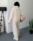 Soft ribbed knitted set made from polyester, viscose and elastane, shown in the image.