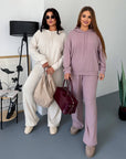Soft ribbed-knit set with polyester, viscose and elastane, shown on a model.