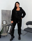 Fleece-lined set with rhinestones, composition of cotton, polyester and elastane, shown in bright and stylish elements.