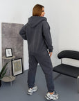 Fleece-lined set with rhinestones, containing 60% cotton, 35% polyester and 5% elastane, shown against a white background.