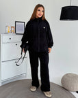 Corduroy set with a composition of viscose 65%, cotton 30% and elastane 5%, shown in the image.