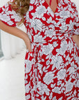 Floral wrap dress от марка YR, polyester и lycra, изображение на цветен модел с уникален дизайн.
