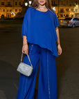 Elegant chiffon dress with rhinestones, polyester and elastane, suitable for formal events or evenings.