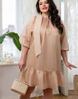 Short dress with a bow and ruffles  от марка YR, polyester и spandex, с елегантен дизайн и детайли на волани.