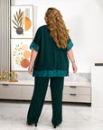 Embroidered blouse and wide-leg trouser set, polyester and lycra, for elegant and comfortable style.