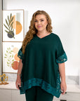 Embroidered blouse and wide-leg trouser set, polyester and lycra, stylish and comfortable women's set.
