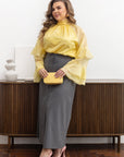 Stylish women’s blouse with ruffles and a high neckline  от YR, tencel и cotton, показана на модел.