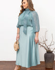 Elegant women’s blouse  YR със Composition 70% polyester и 30% spandex, изображение на блузата върху модел.