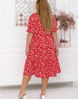 Knee-length dress with ruffle