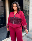 Bomber jacket and trouser set with mesh made from polyester and viscose, with a stylish design and modern look.