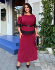 Set with a long skirt and lace, made from polyester, viscose and lycra, with delicate design, shown in the image.