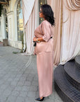 Stylish satin set with a belt, 97% polyester and 3% elastane, image of elegant set for home wear.