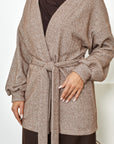 Short fluffy cardigan with belt