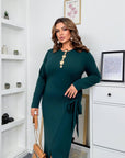 Midi dress with a slit made from polyester, viscose and lycra, with an elegant design and flared cut.